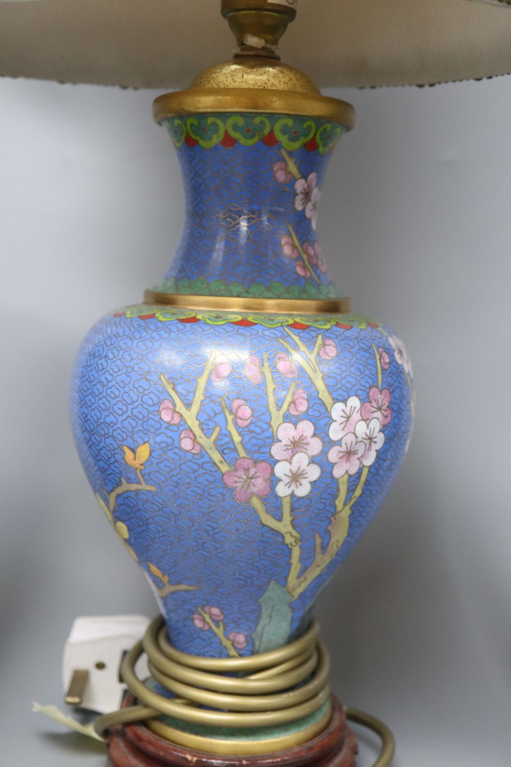 A pair of Chinese bronze iris decorated vases, height 28cm and a cloisonne lamp